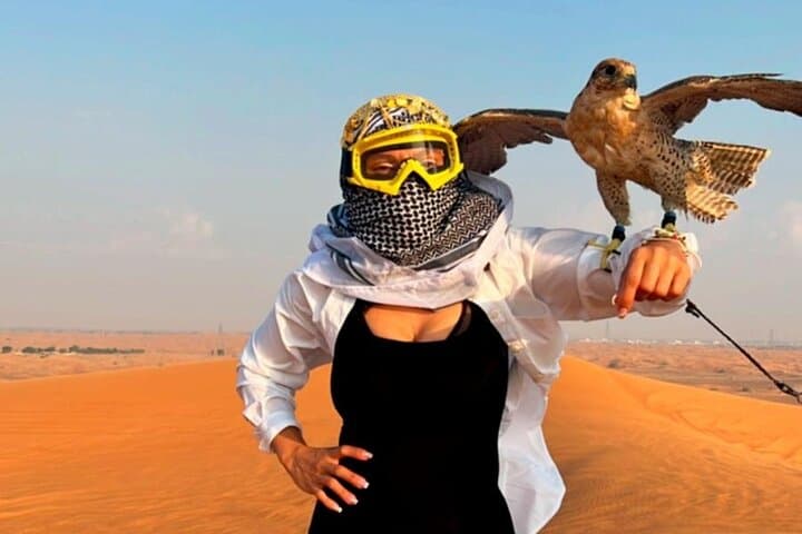Dubai Red Dune Quad Bike Adventure with BBQ Dinner & Live Show photo 6