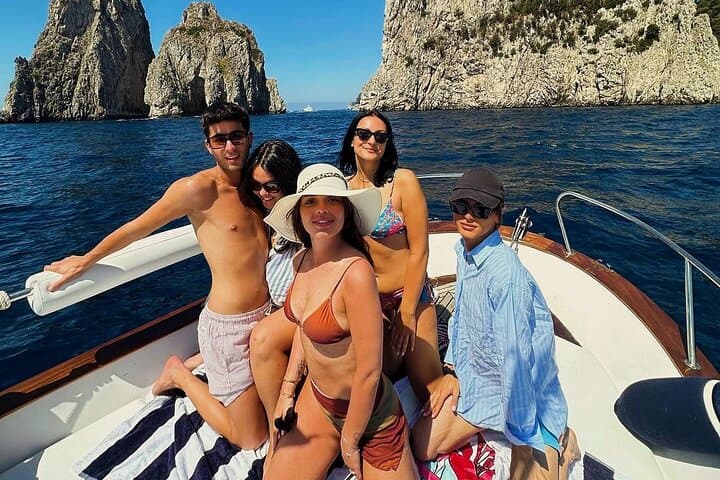 Capri Private Gozzo Boat Tour: Blue Grotto, Faraglioni & Coastal Caves photo 6