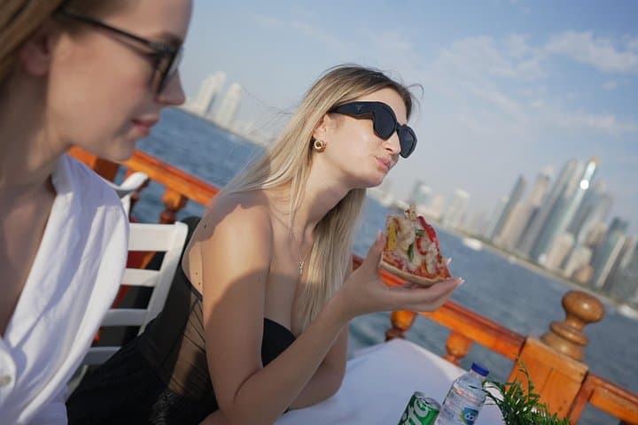 Dubai Creek Dhow Cruise — 1-Hour Sightseeing with Unlimited Fresh Pizza photo 2