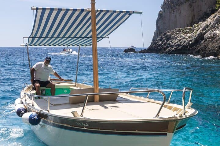 Private Capri Boat Tour: Blue Grotto, Faraglioni & Snorkel photo 4