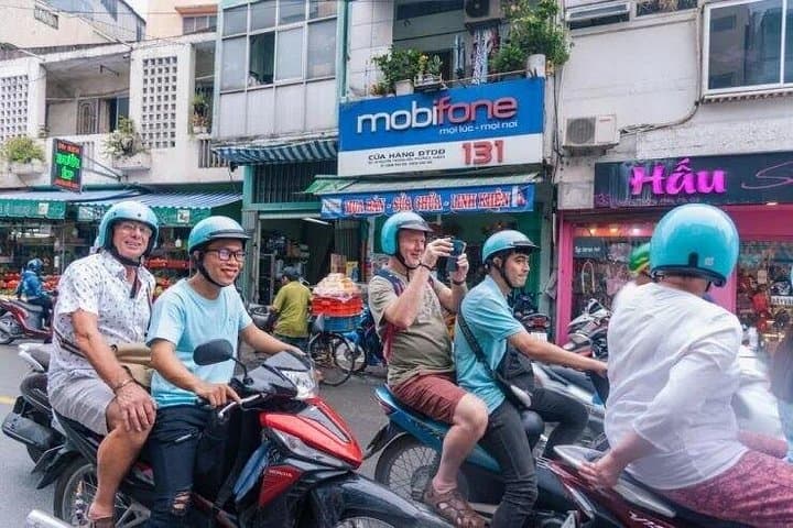 Saigon Motorbike Highlights and Unseen Streets 3.5-Hour Scooter Tour photo 3