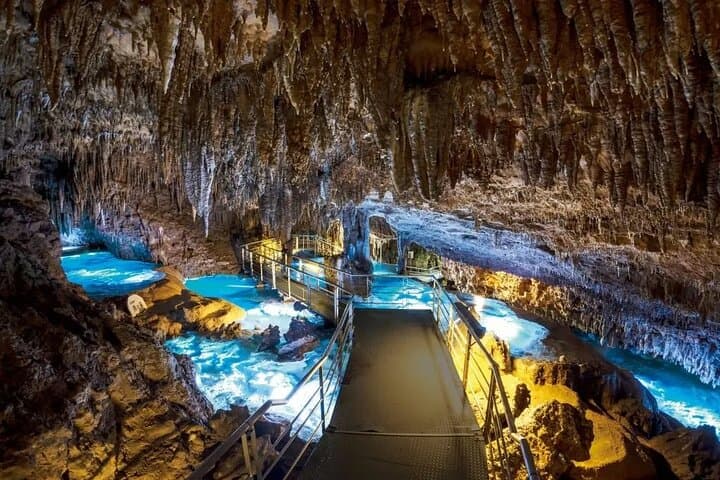 Explore Gyokusendo Cave & Ryukyu Culture at Okinawa World photo 4
