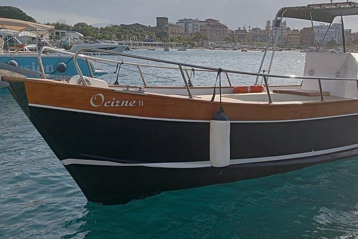 Taormina Giardini Naxos Boat Excursion: Isola Bella, Blue Grotto & Dolphin Tours photo 1