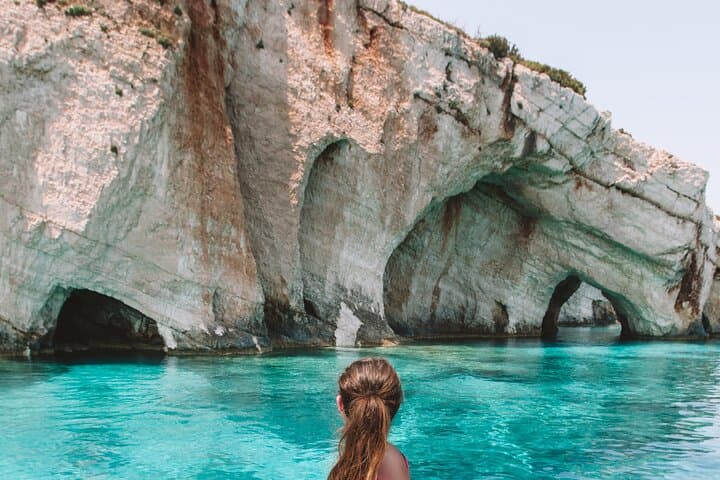 Sunset Cruise to Zakynthos Blue Caves with Wine — Small-Group Swim & Photo Stops