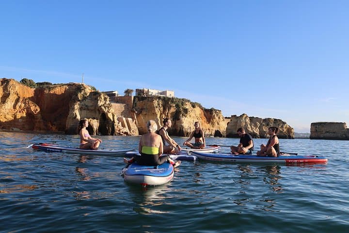 Sunrise SUP Yoga at Praia dos Estudantes — Lagos Floating Zen Experience photo 2