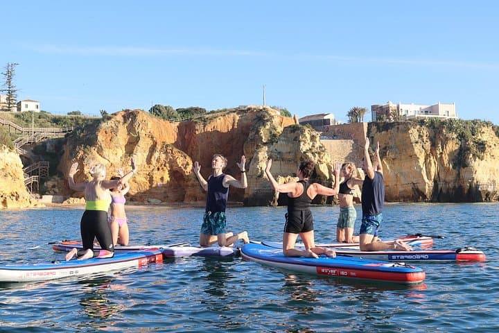 Sunrise SUP Yoga at Praia dos Estudantes — Lagos Floating Zen Experience photo 3