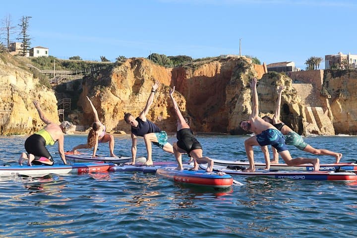 Sunrise SUP Yoga at Praia dos Estudantes — Lagos Floating Zen Experience photo 4