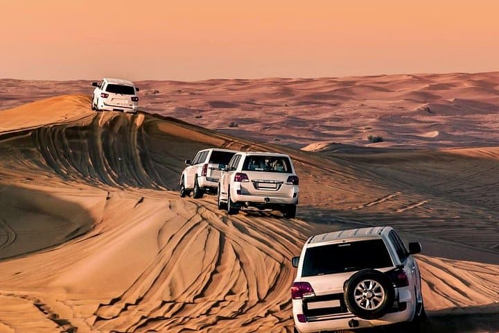 Doha Desert to Inland Sea: 4x4 Dune Ride, Sandboarding & Swim photo 4