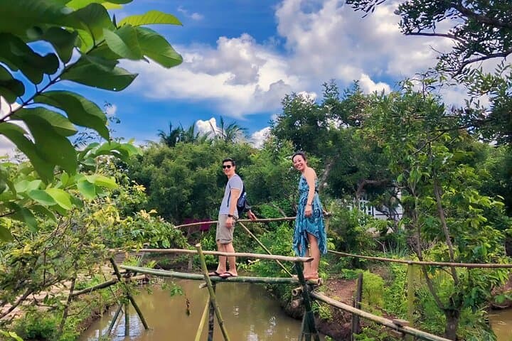 Cu Chi Tunnels & Mekong Delta Day Trip from Ho Chi Minh City — Tunnels, Boats, and Orchard Stops photo 2