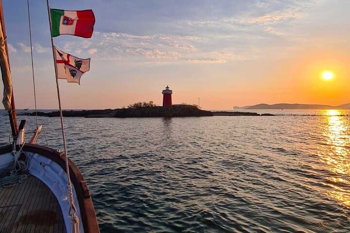 Alghero Sunset Sailing Tour with Aperitif: Vintage Boat, Snorkel & Capo Caccia Views photo 2