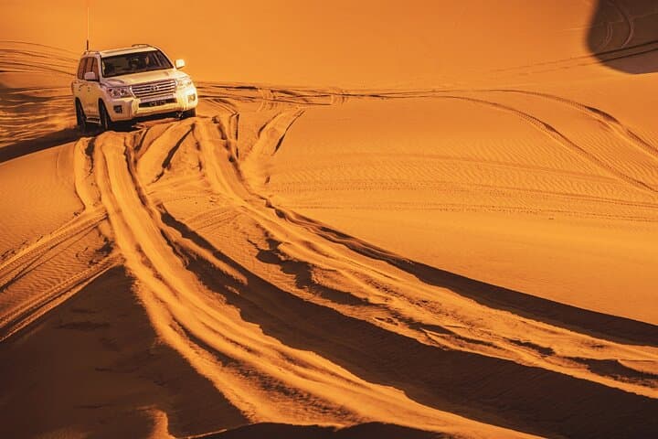 Dubai Desert Safari with BBQ Dinner: Dune Bashing, Camel Rides & Evening Shows photo 2