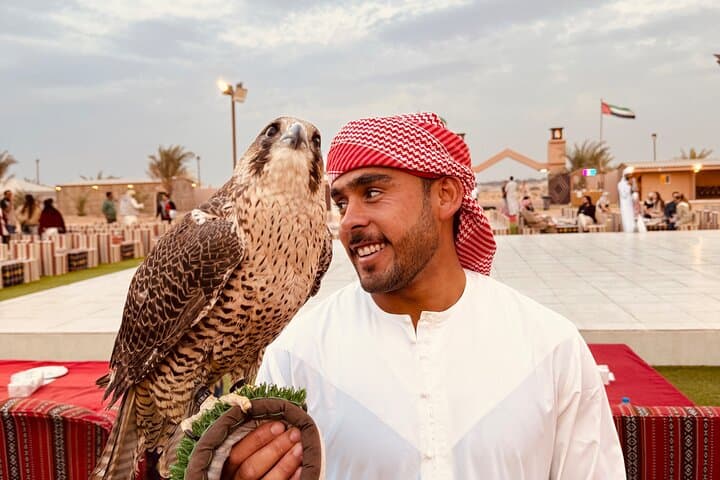 Dubai Red Dunes Sunrise & Sunset Desert Safari with Camel Ride, Falconry and Sandboarding photo 4