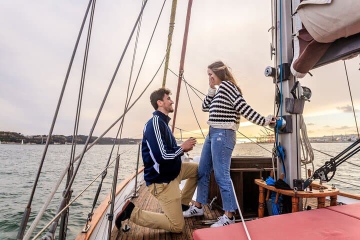Sunset Proposal on a Vintage Sailboat in Lisbon