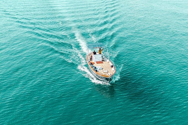 Taormina Giardini Naxos Boat Excursion: Isola Bella, Blue Grotto & Dolphin Tours photo 3