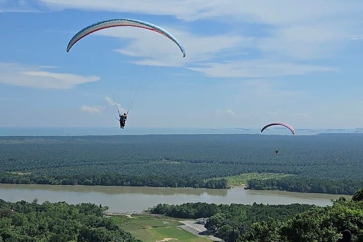 Tandem Paragliding at Bukit Jugra: Fly Above the Jugra Lighthouse and Straits of Malacca photo 2