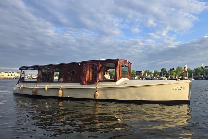 Private Amsterdam Canal Cruise: 2-Hour Historic Boat Tour with Welcome Drink photo 1