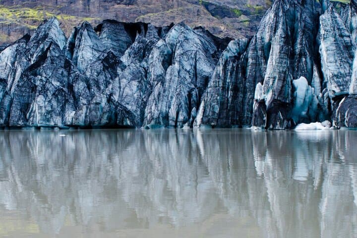 South Coast Adventure: Solheimajokull Glacier Hike, Waterfalls & Black‑Sand Beaches photo 3