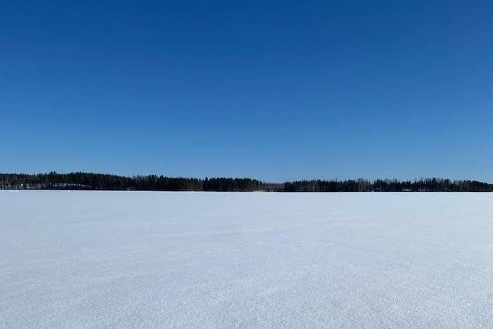 Ice Fishing on a Frozen Lake near Rovaniemi — Small-Group Arctic Experience photo 4