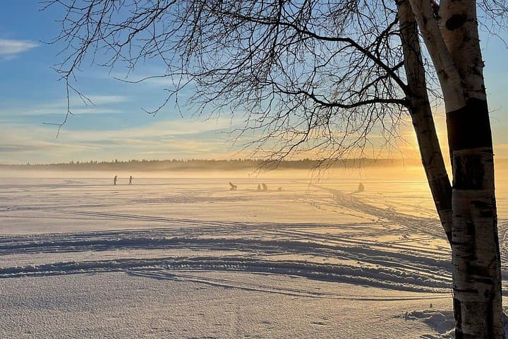 Ice Fishing on a Frozen Lake near Rovaniemi — Small-Group Arctic Experience photo 1