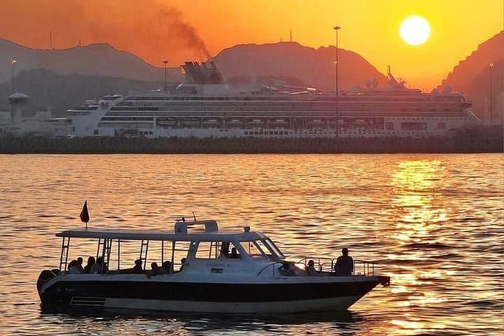 Sunset Speed Boat Cruise in Muscat: Coastal Views, Dolphins & Snorkeling