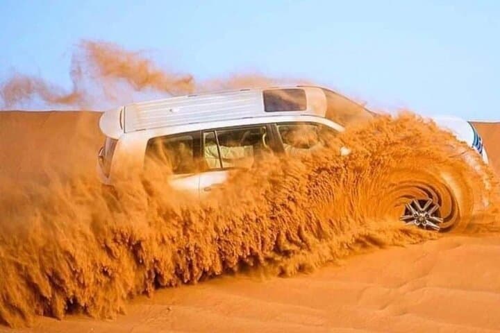 Dubai Desert Safari: Dune Bashing, Camel Ride & Bedouin BBQ Experience
