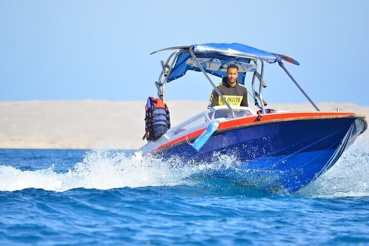 Hurghada Dolphin House: Private Speedboat Snorkel and Parasailing Adventure