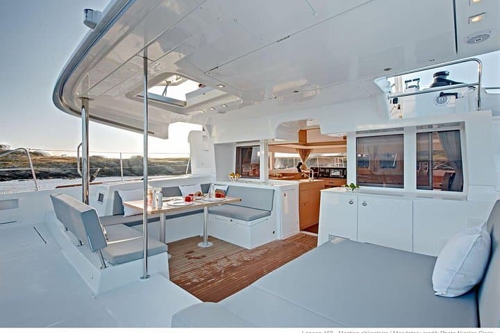 Mykonos Catamaran Cruise to Delos & Rhenia — Day and Sunset Tours with Lunch