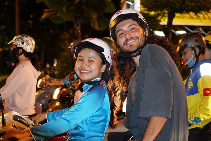 Saigon Michelin Scooter Food Tour with Female Ao Dai Guide photo 3