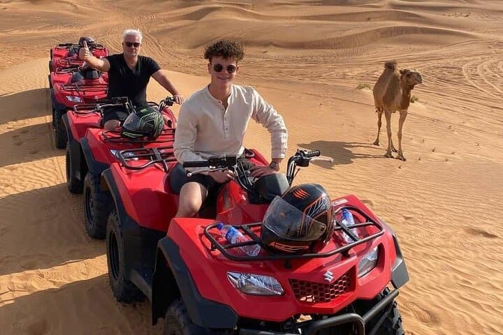 Dubai Dunes Trio: Buggy Rides, Sandboarding & Camel Treks in the Red Desert
