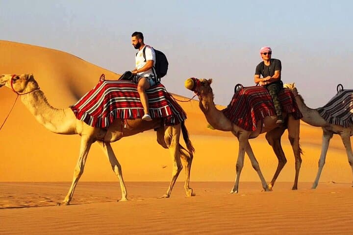 Dubai Desert Camel Ride and Quad Biking Adventure — Dunes, Culture & Adrenaline