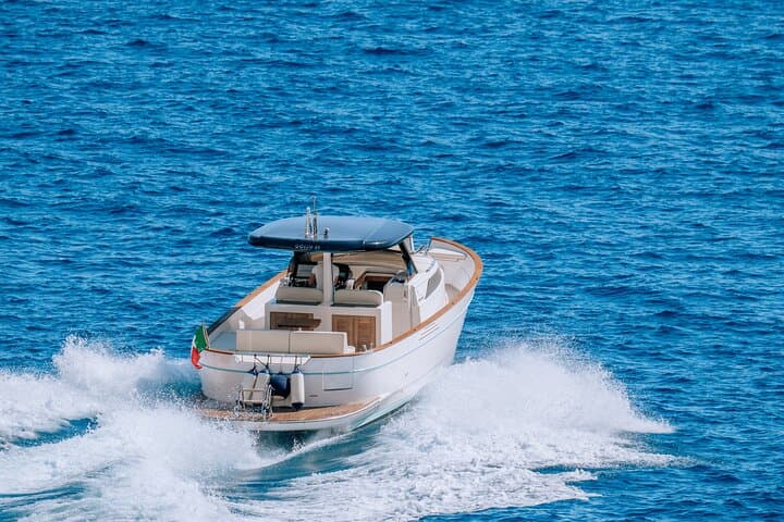Private Gozzo Tour to Capri, Faraglioni & Blue Grotto from Positano photo 3