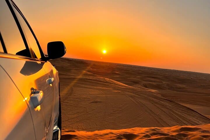 Sunrise Desert Safari in Dubai: Red Dunes 4x4, Camel Ride & Sandboarding photo 1