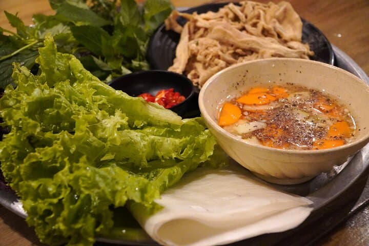 Saigon Michelin Scooter Food Tour with Female Ao Dai Guide photo 2