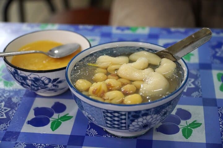Saigon Michelin Scooter Food Tour with Female Ao Dai Guide photo 5