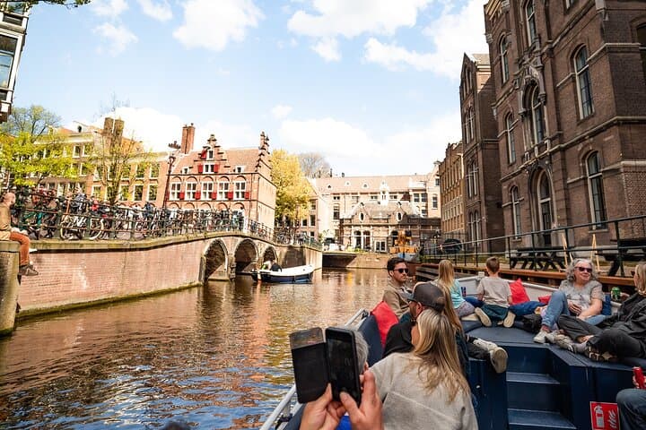 Open Boat Canal Cruise in Amsterdam Old City Centre — Eco Electric Canals photo 1