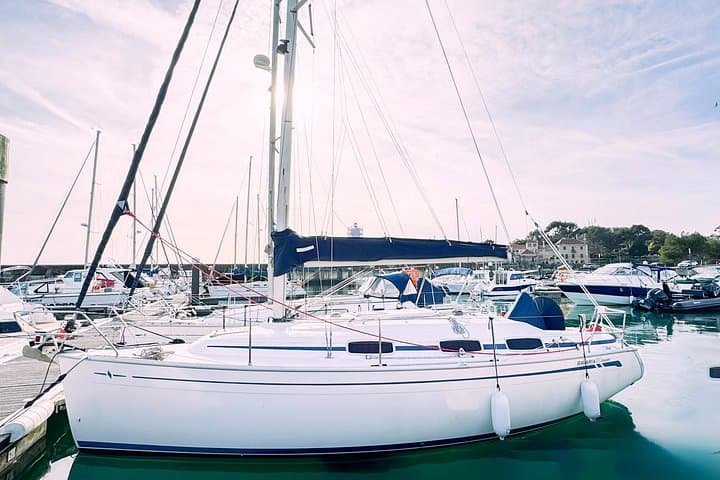 Bohemian Sailing in Cascais: Swim, Snorkel & Coastal Boat Tour photo 1