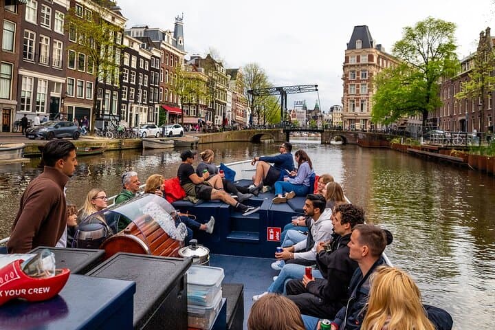 Amsterdam Open-Boat Canal Cruise with Live Guide & Two Drinks