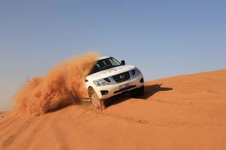 Luxury Evening Desert Safari in Dubai — VIP 4x4 Dune Bashing & Lakeside Desert Camp photo 2