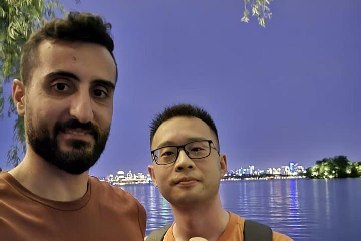 Authentic Hangzhou 2-Day Local Guide — West Lake, Tea Villages & Wulin Night Market photo 1