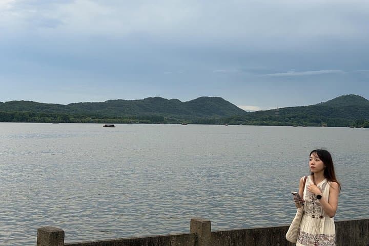 Authentic Hangzhou 2-Day Local Guide — West Lake, Tea Villages & Wulin Night Market photo 2