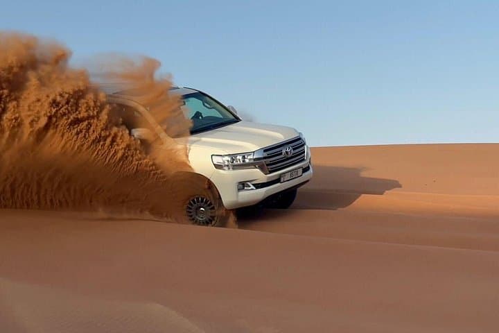 VIP Red Dune Safari Dubai: 4x4 Dune Bashing, Camel Ride & BBQ Under Desert Skies photo 3