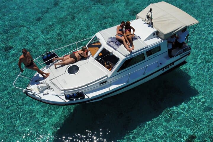 La Maddalena Boat Tour: Pink Beach, Natural Pools & Sardinian Lunch photo 6