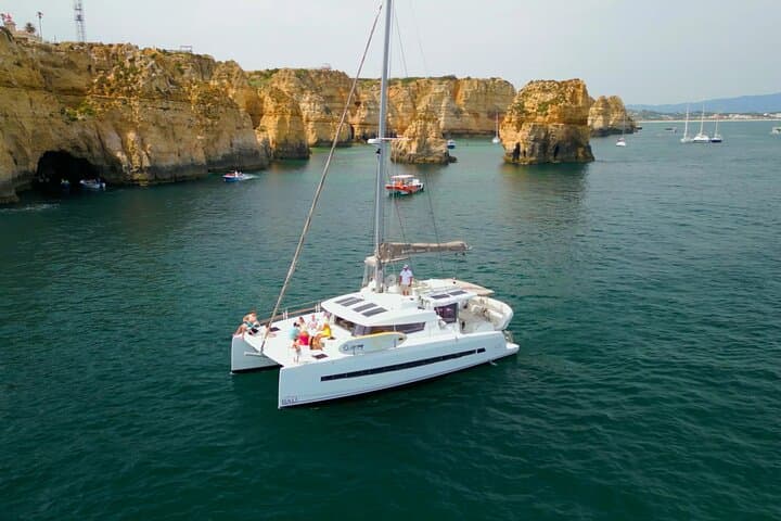 Private Catamaran Cruise from Lagos to Benagil — Algarve Coastal Charter photo 1