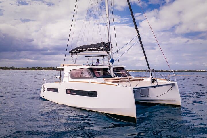 Private 34' Aventura Catamaran in Tulum: Snorkel, Paddle & Open Bar