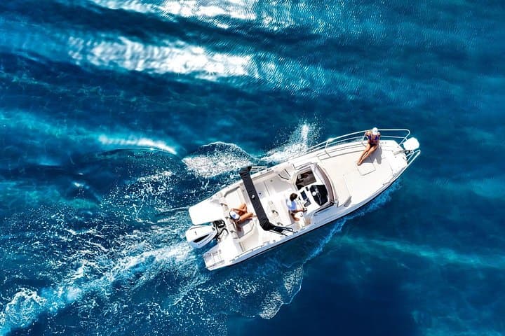 Capri Private Boat Tour from Sorrento — Faraglioni, Blue Grotto & Snorkeling photo 1