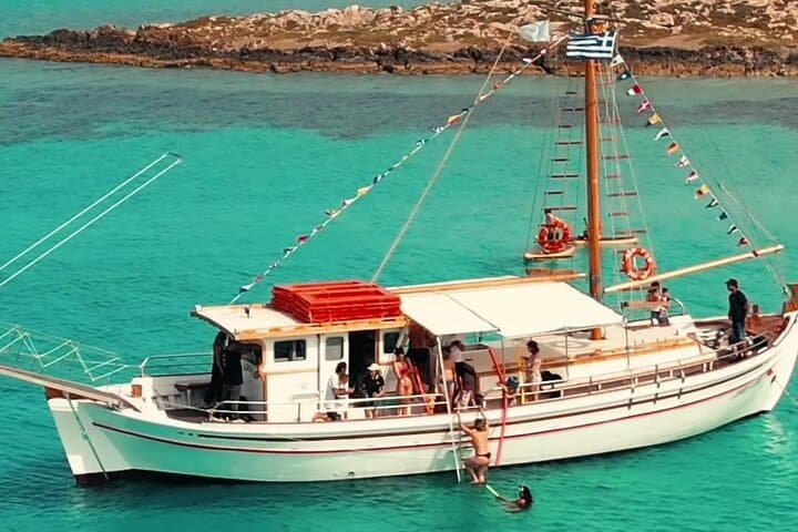 Blue Lagoon & Antiparos Sea Caves: Half-Day Cruise from Alyki