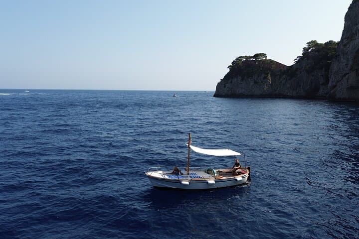 Sunset on a Classic Gozzo in Capri: Prosecco, Faraglioni & Punta Carena Views photo 5