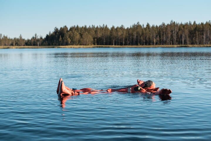 Autumn Lake Floating in Rovaniemi: Daytime Arctic Survival-Suit Experience photo 2