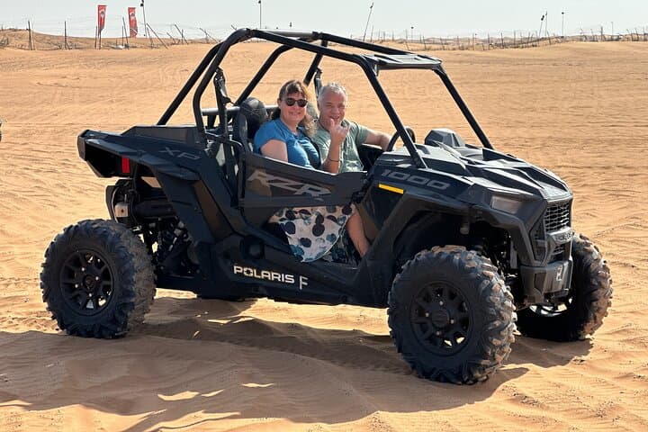 Dubai Morning 2-Seater Buggy Desert Tour: Dune Bashing, Sandboarding & Camel Ride photo 2