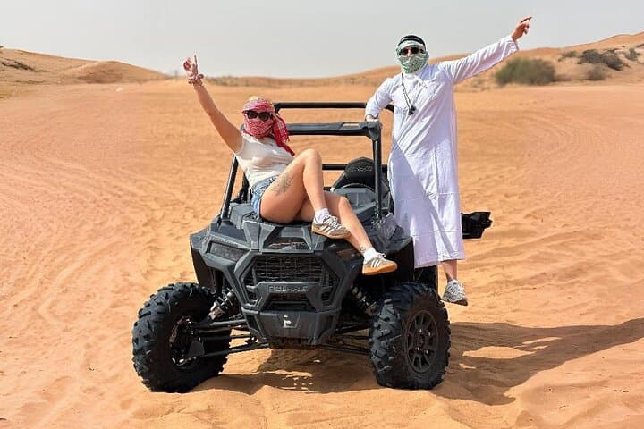 Dubai Morning 2-Seater Buggy Desert Tour: Dune Bashing, Sandboarding & Camel Ride